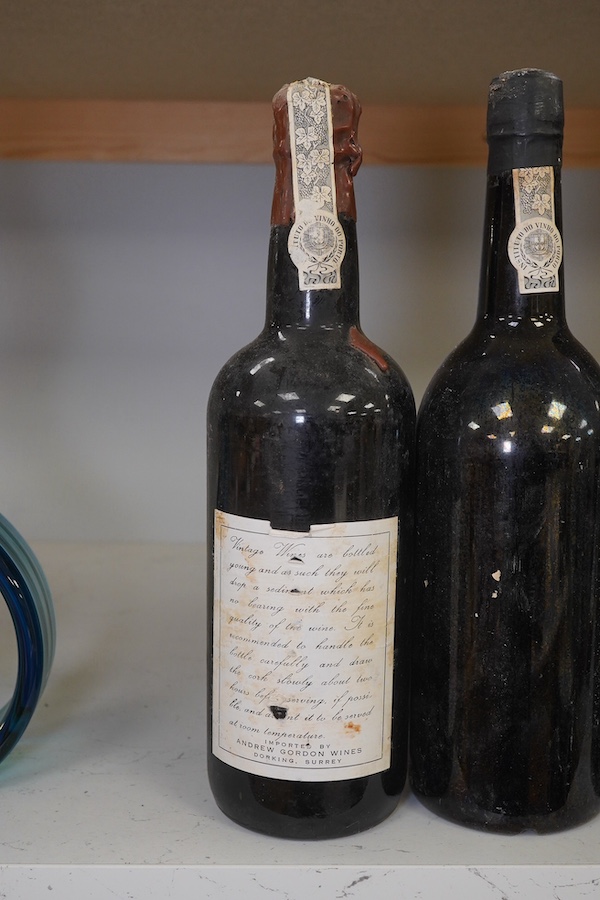 Five bottles of port to include three bottles of Warre’s 1975 (no label), a bottle of C. Da Silvas Vintage 1982 port and a 37.5cl bottle of Warres 1987 Quinta Da Cavadinha. Condition - fair to good, three bottles without